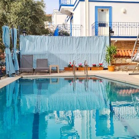 Shared Pool Flat Located 3 Min To Beach In Kalkan Apartman Kültér fotó