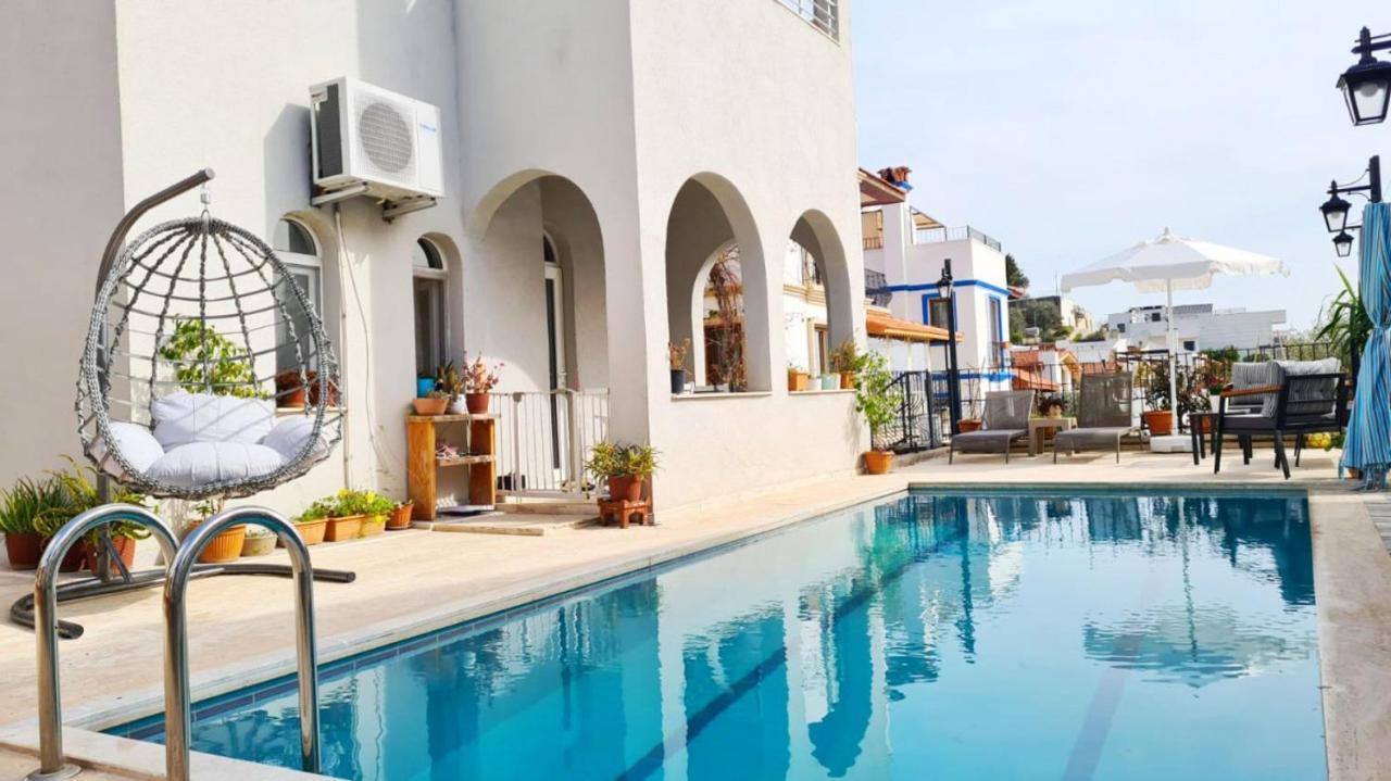 Shared Pool Flat Located 3 Min To Beach In Kalkan Apartman Kültér fotó